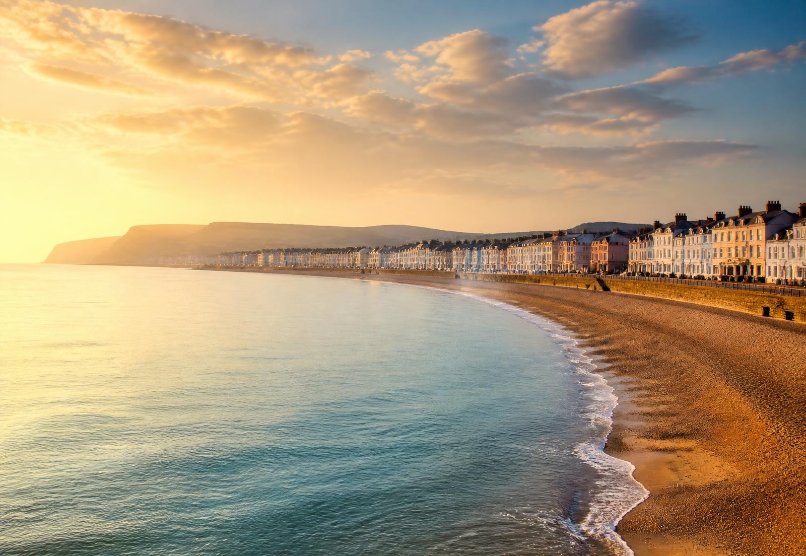 Weymouth seafront and beach at golden hour along the Jurassic Coast